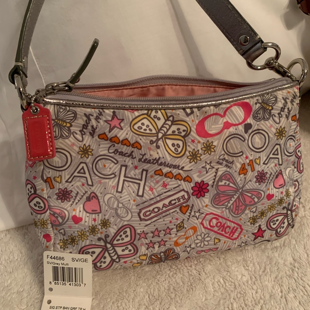 Like New Coach Swinger Bag Silver Est 1941 Graphic